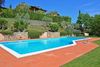 Villa with private garden and lake view in context with swimming pool in Soiano del Lago