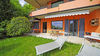 Renovated three-room apartment with private garden and lake view in Soiano del Lago