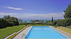 Appartamento fronte lago con giardino privato in residence esclusivo a Moniga del Garda