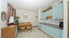 Two-room apartment with two terraced-gardens and parking space, in Gardone Riviera for Sale