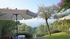 Three-room apartment with exclusive lake-view garden, in residence with pool, in Gardone Riviera for Sale