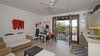 Three-room apartment with exclusive lake-view garden, in residence with pool, in Gardone Riviera for Sale