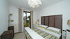 Three-room apartment with exclusive lake-view garden, in residence with pool, in Gardone Riviera for Sale