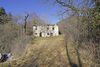Characteristic stone rustic house immersed in the green hills of Gargnano