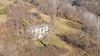 Characteristic stone rustic house immersed in the green hills of Gargnano
