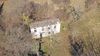 Characteristic stone rustic house immersed in the green hills of Gargnano