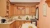 LARGE APARTMENT WITH LAKE VIEW IN THREE-FAMILY HOUSE FOR SALE IN TREMOSINE SUL GARDA