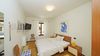 Three-Room Apartment with Private Courtyard, Swimming Pool and Sauna Just Steps from the Lake in Bogliaco di Gargnano.