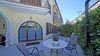 Three-Room Apartment with Private Courtyard, Swimming Pool and Sauna Just Steps from the Lake in Bogliaco di Gargnano.
